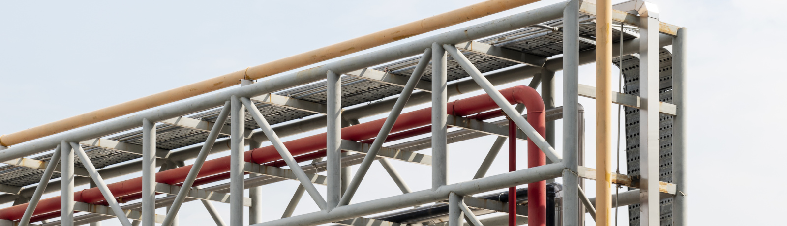 Pipeline Framework Against Blue Sky Red 1600x460